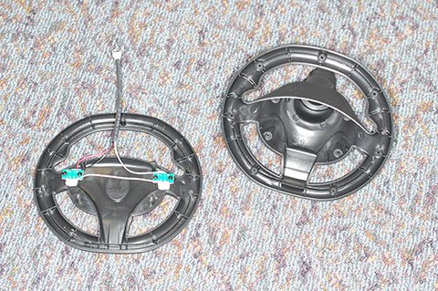 Front and rear parts of the steering wheel
